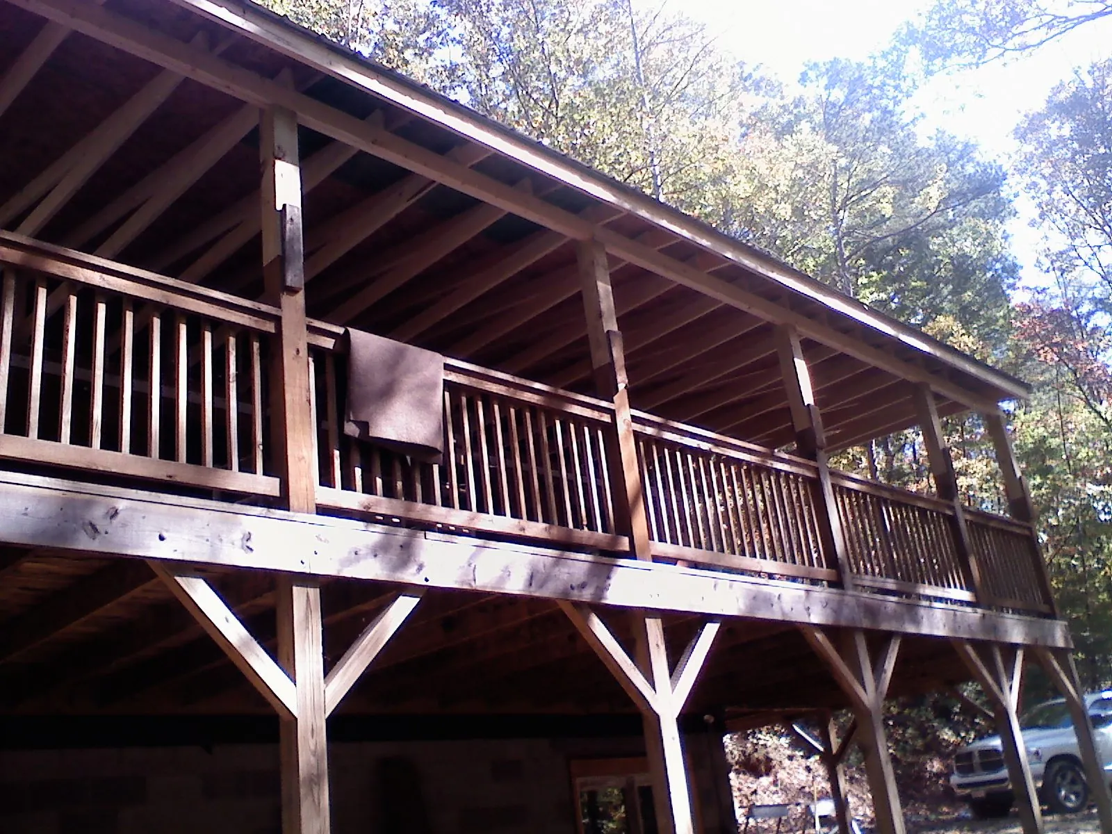 Timber framing under a new elevated porch and deck — Roof Leak Repair in Millersport by Roofing Brothers